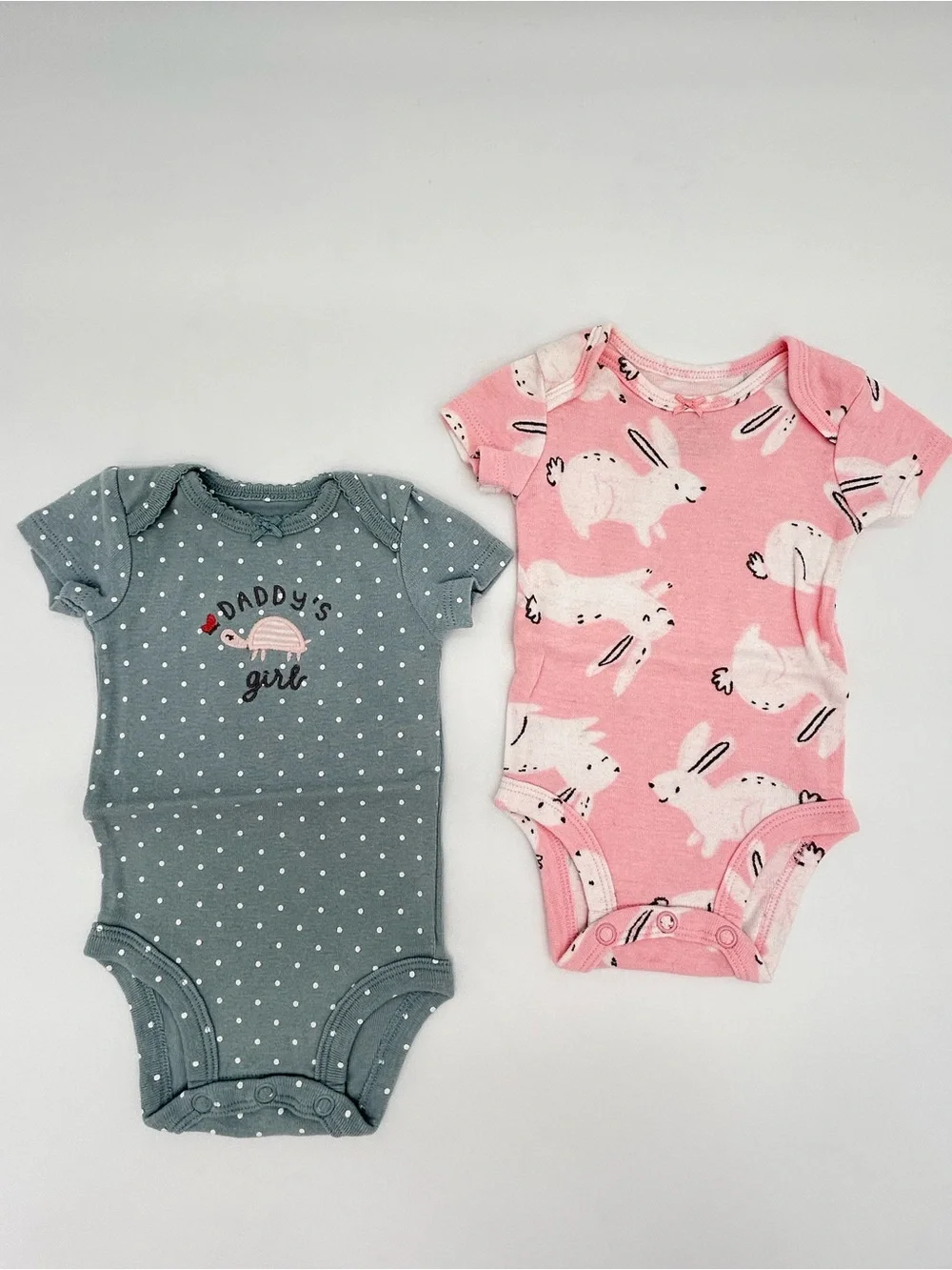 Carter’s/Child of Mine Set of 4 Onesies Size NB
